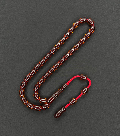 Sistemli Cubuk Sikma Kehribar Tesbih